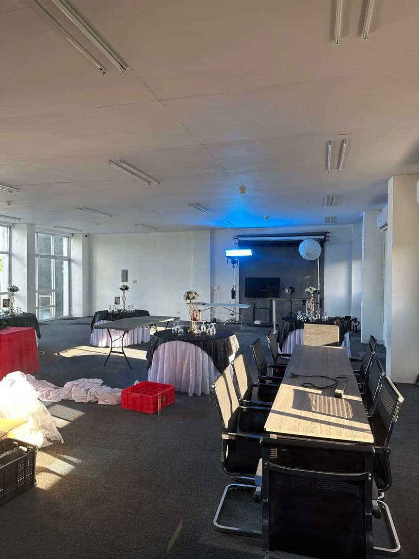 The production floor, lights, and equipment at the Conex Media studio in Imus