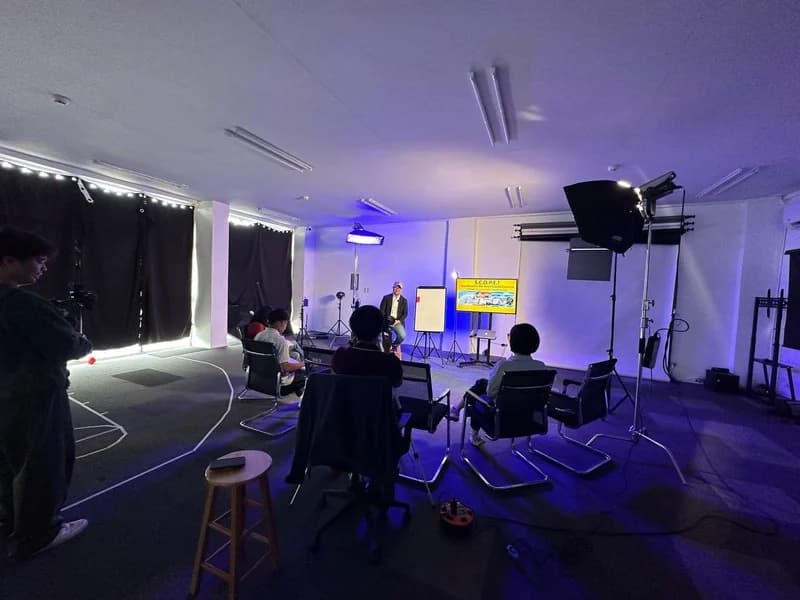 A workshop setup inside the Conex studio